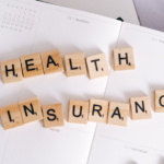 Cubes spelling Health Insurance, symbolizing Expatease service of helping expats find the best and suitable healthcare insurance in Germany